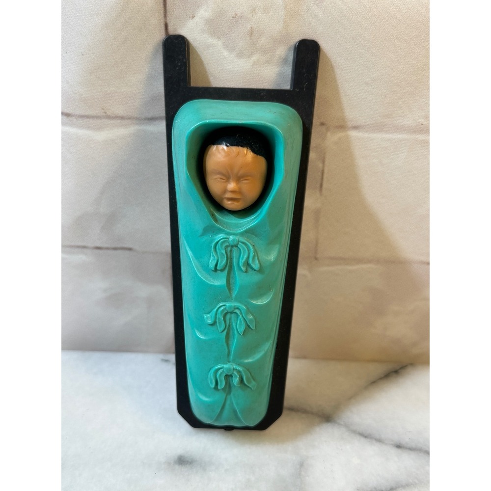 Vintage Plastic Swaddled Baby Wall Hanging Teal Black Sled Kitsch Decor 6.5in